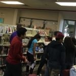 Students looking at the Teen Section